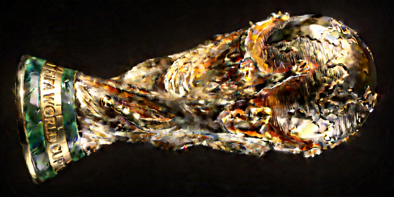 历届世界杯冠军奖杯大力神杯在聚光灯下的特写照片